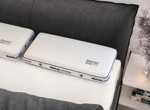 Almohada Nucol Soft de Gomarco en un dormitorio